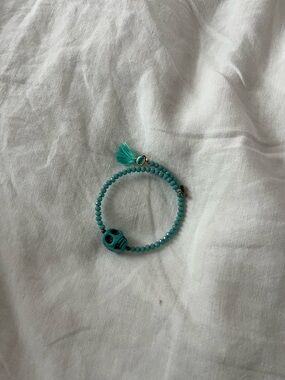 Turquoise Beaded Bracelet with Skull Charm